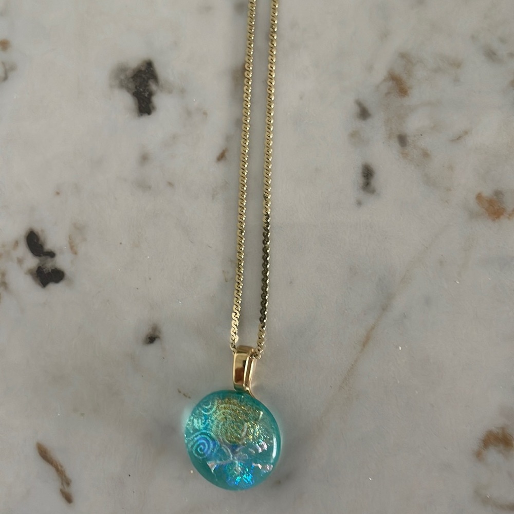 Hand brown glass rounded disc necklace.